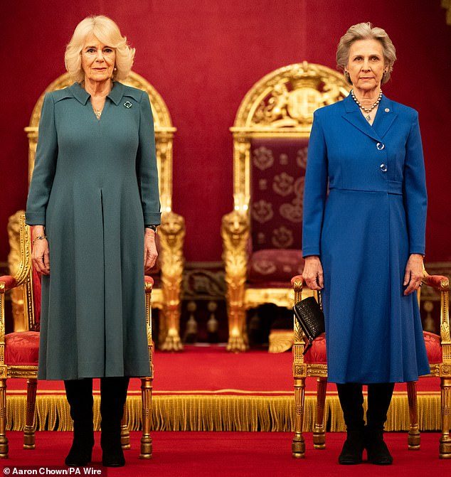 Queen Camilla praises cancer specialists amid her husband’s battle with the disease as she’s joined by the Duchess of Gloucester to present the Queen’s Anniversary Prizes at Buckingham Palace