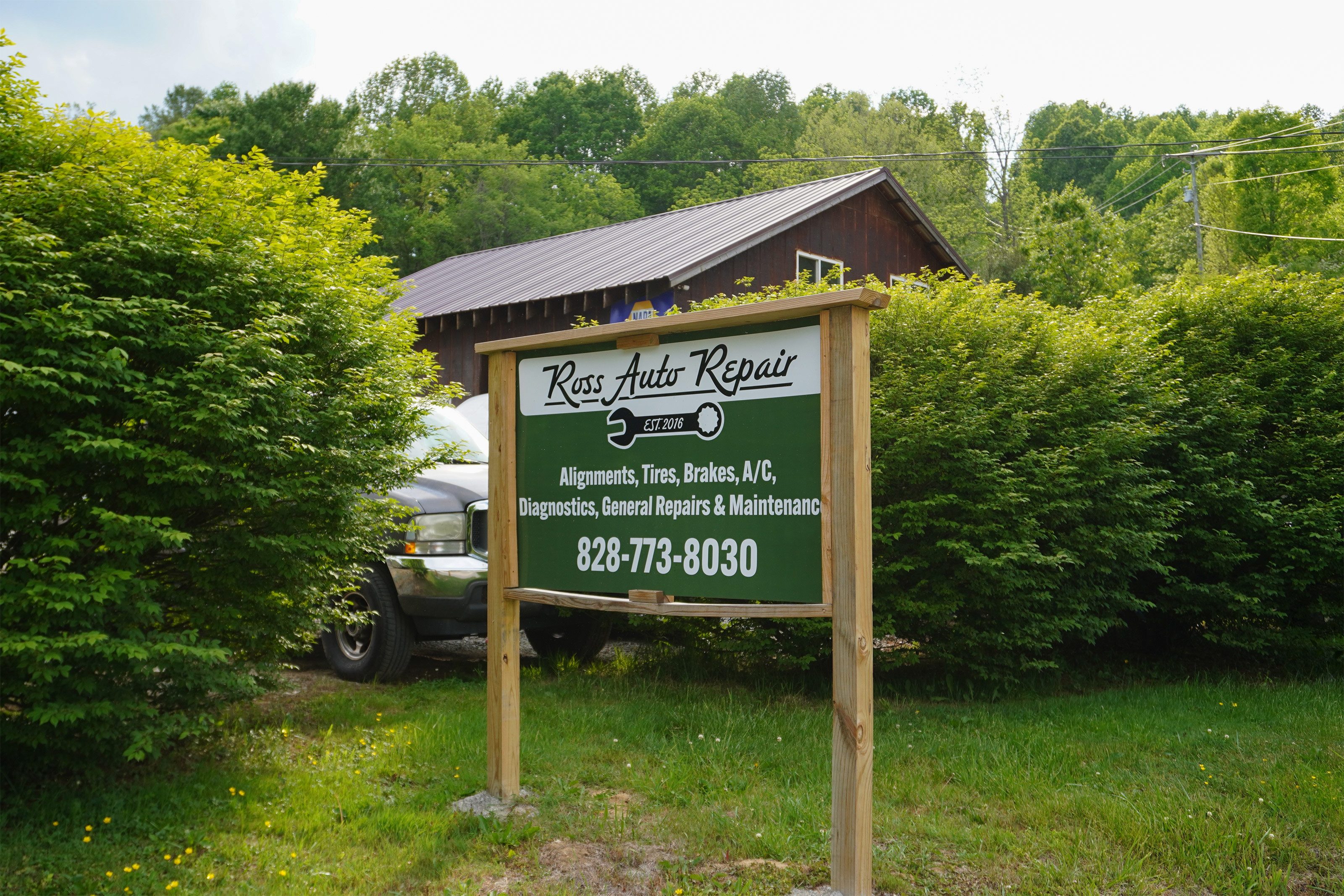 A sign for Ross Auto Repair, owned by Ross and Rebecca Tobiassen.